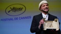 'This is beyond the Oscar': John Travolta wins surprise Cannes honorary Palme d'Or