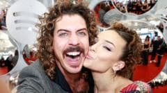 Australian musician's US ban prompts apology from girlfriend over Trump post